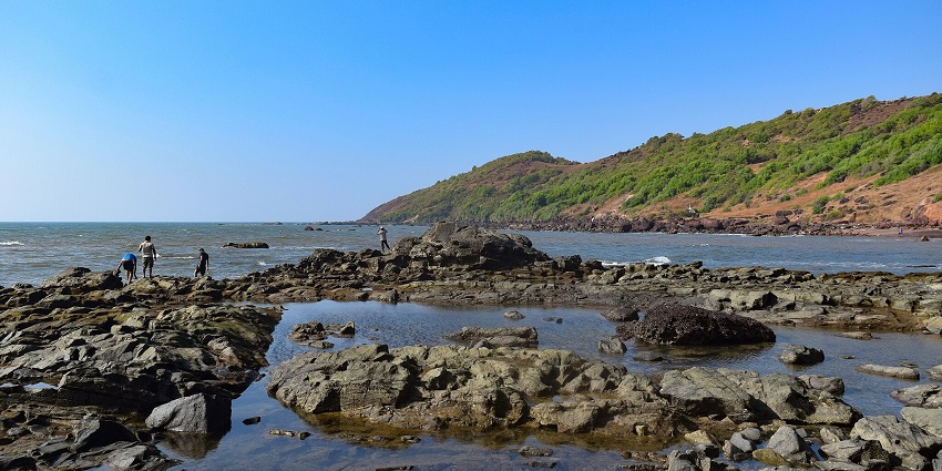 Shallow water at Anjuna Beach, ideal for swimming.