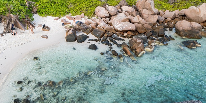 An image of Anse Cocos, a hidden gem beach with white sand and crystal-clear waters