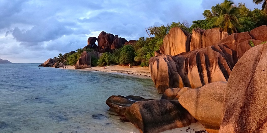 Exquisite white sandy beach surrounded by large granite boulders in Anse Source D’Argent.