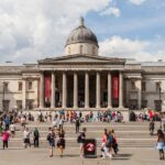 An Image of the visitors gathered around the steps of the National Art Gallery London.