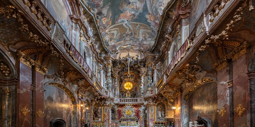 Baroque Asamkirche façade nestled between townhouses on Munich’s Sendlinger Straße