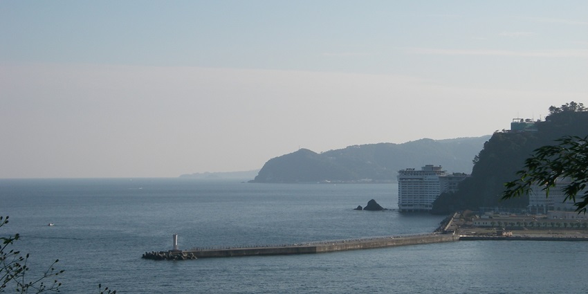 Popular seaside hot spring resort with stunning coastal scenery.