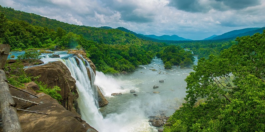 An image of Athirapally Falls, one of the best Places to Visit in Monsoon in South India