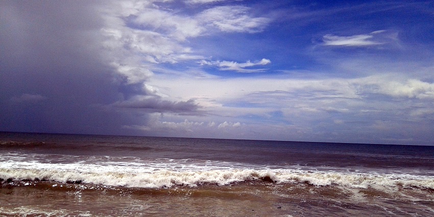 An image of the Auroville beach, with waves, one of the top bikini beaches in India