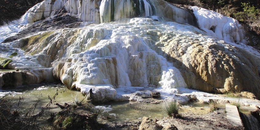Bagni San Filippo is one of the Tuscany hot springs famous for its limestone formations.