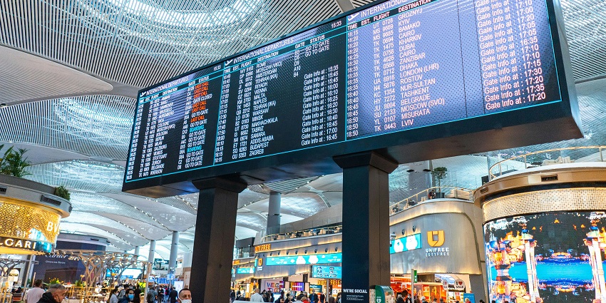 A flight information display in the Ban Huoeisay Airport.