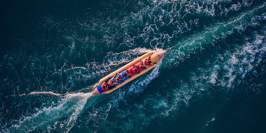A representative image of a group enjoying a boat ride on a lake in Lonavala.