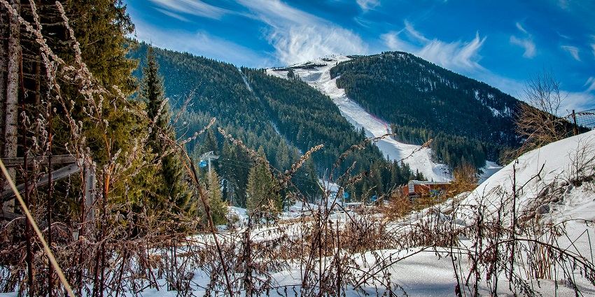 Image of Green Mountain Covered With Snow during day time view with clear sky