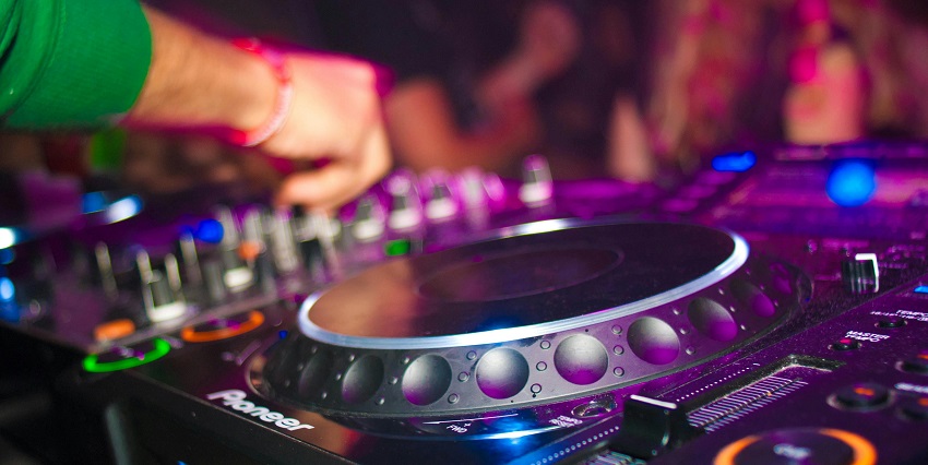 A glimpse of nightlife comes alive at Barnyye Tantsy, a club with vibrant music and dancing.