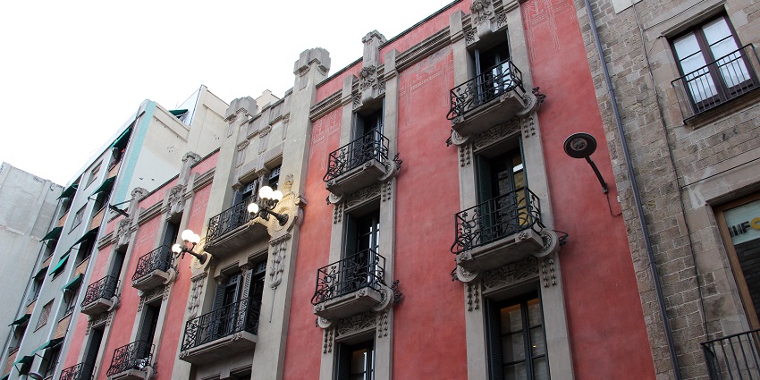 A view of the beautiful and historic buildings of Barri Gòtic in Barcelona, Spain.