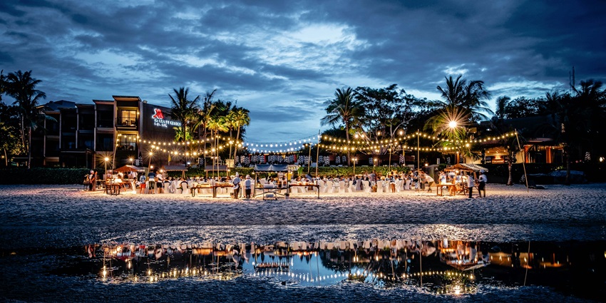 Beachside bar with a vibrant party atmosphere, a top place to enjoy Seychelles nightlife.