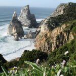 A glimpse of one of the beaches near Lisbon with golden sands and crystal clear waters.