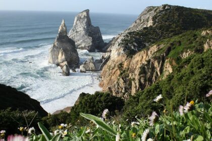 A glimpse of one of the beaches near Lisbon with golden sands and crystal clear waters.