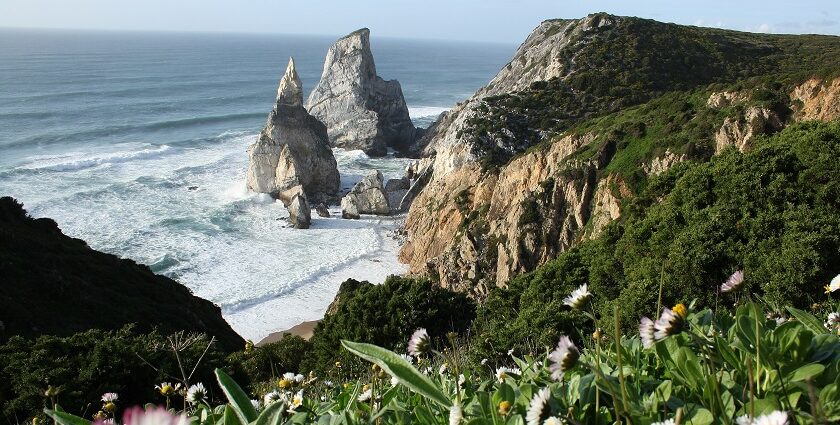 A glimpse of one of the beaches near Lisbon with golden sands and crystal clear waters.