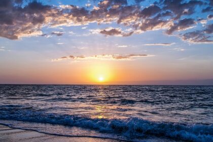 Stunning sunset witnessed at one of the serene and famous beaches near Naples, Italy