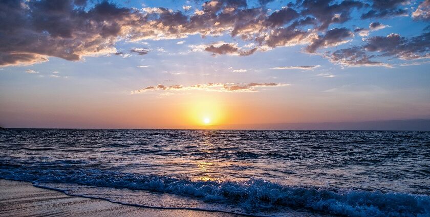 Stunning sunset witnessed at one of the serene and famous beaches near Naples, Italy