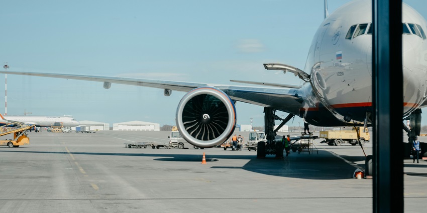 Image of white airliner on runway - Beijing Capital International Airport