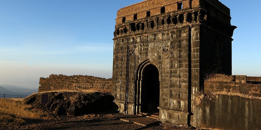 Visit Rajdher Fort in winter for cool weather, great trekking, and stunning views