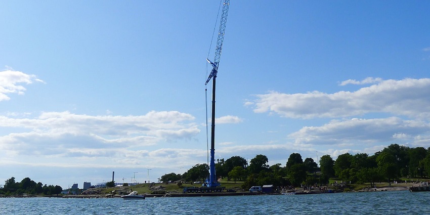 A view of bungee jumping by the riverside