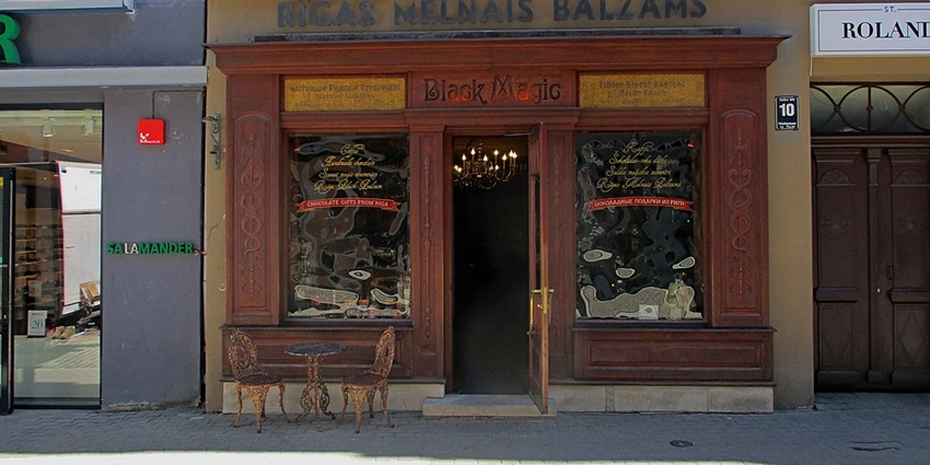 An image of Black magic bar entrance offering craft cocktails to enjoy Riga nightlife