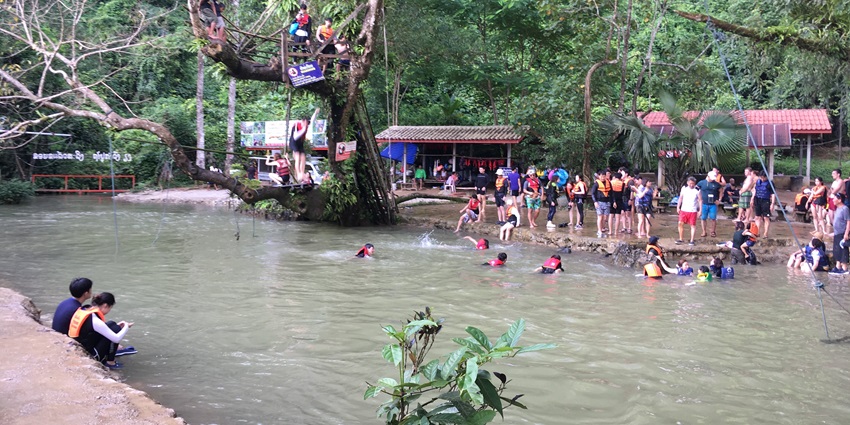 Image of The picturesque Blue Lagoon in Vang Vieng and people enjoying