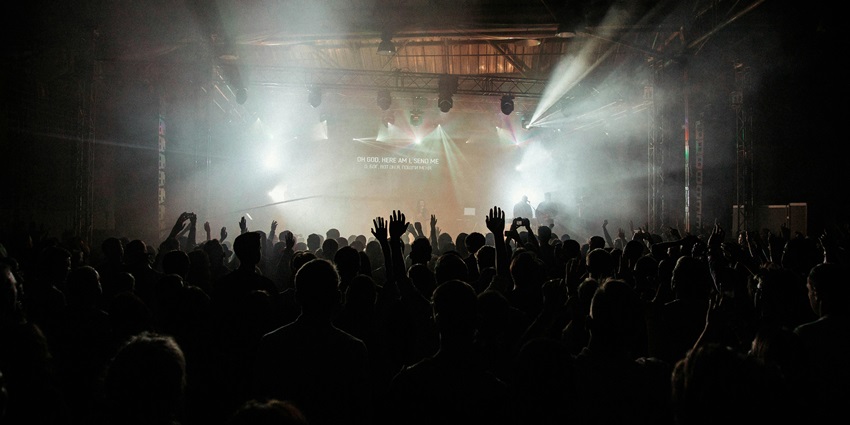 People cheering and celebrating during New Year’s Eve experience unlike any other.