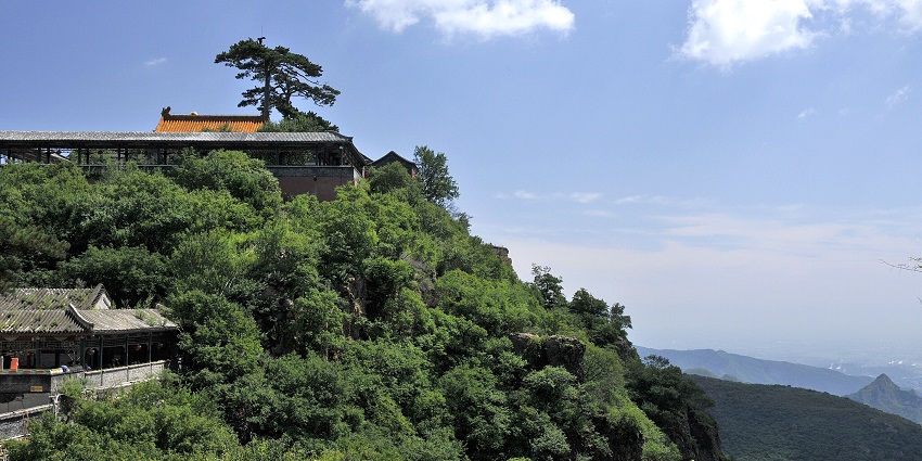 Peaceful mountain Korean temple offering breathtaking views and spiritual significance.