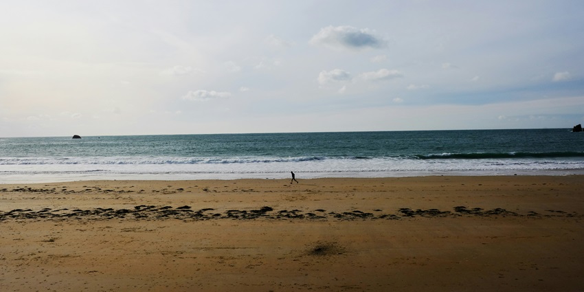 A sandy beach with clear waters and a lively promenade, among the best beaches in UK.