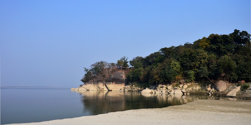 Image of Brahmaputra river side with rocky hills - at Brahmaputra River Valley in India