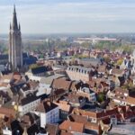 Bruges city guide takes you through the medieval charm, cobblestone streets, and architecture