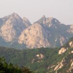 Bukhansan National Park offers hiking, stunning views, temples, and wildlife.