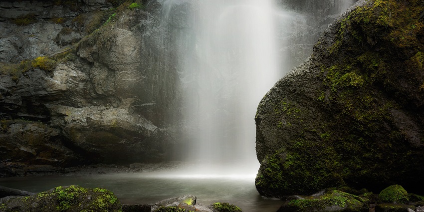 An image of a waterfall resembling the Burgbach Waterfall, one of the best waterfalls in Germany.