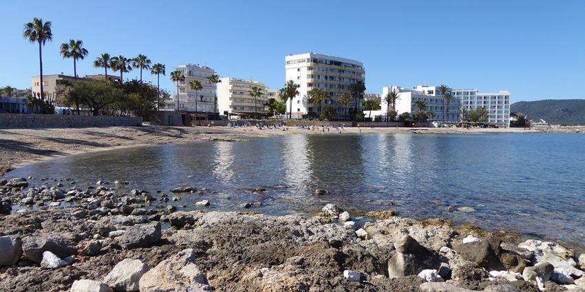 Picturesque view of serene beach - The beauty of Cala Bona by the calm waters