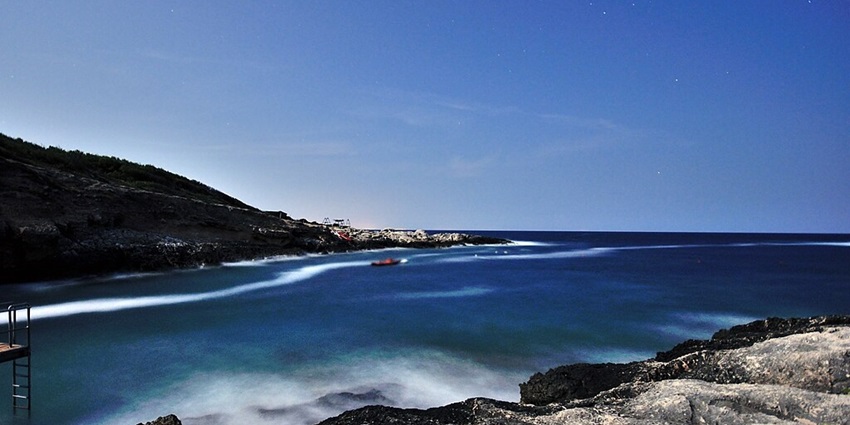Witness Cala San Giorgio with a gorgeous shoreline.