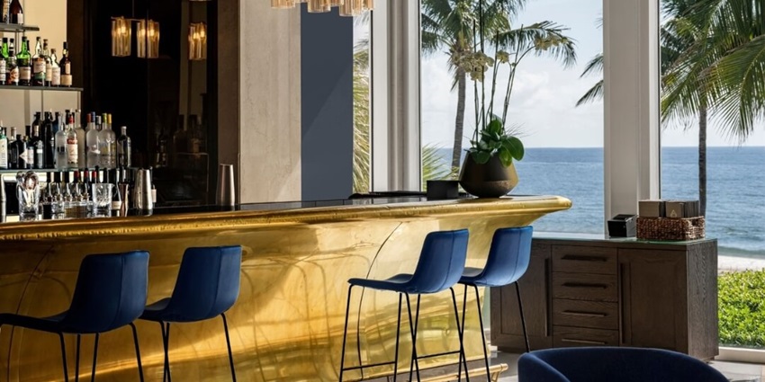 An amazing view of the lounge bar with a beach view