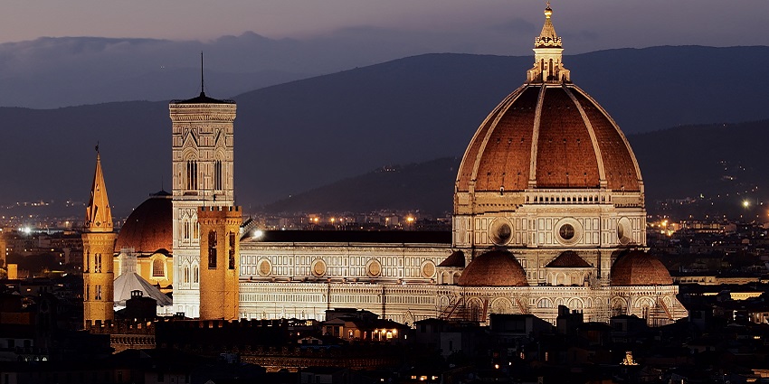 An illuminated view of the grand Florence Duomo, as seen from Michelangelo Hill.