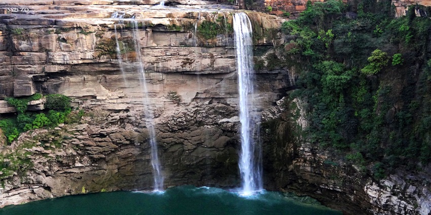 View of Scenic waterfall near Bandhavgarh, ideal for nature walks and relaxation.