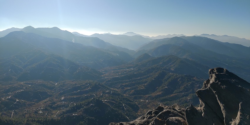 View of Chauli Ki Jali, a unique rock formation - one of the places to visit near Mukhteshwar.