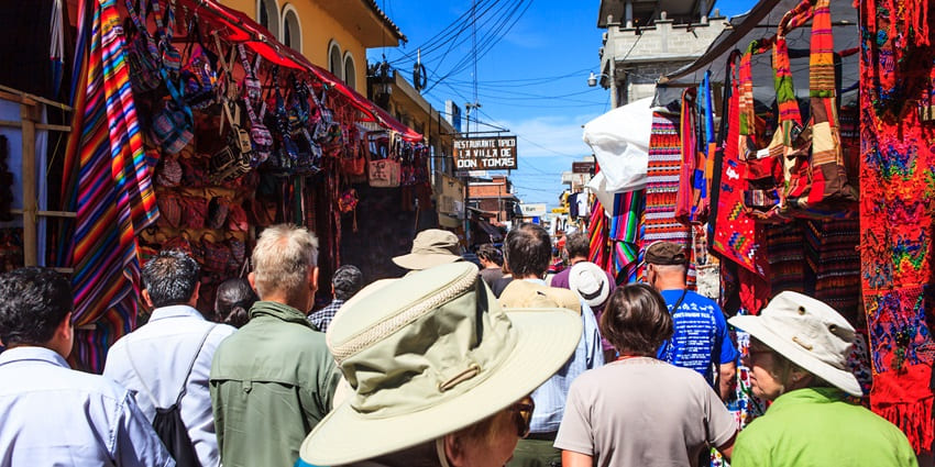 A lively indigenous market filled with vibrant textiles, handmade crafts, and rich cultural traditions