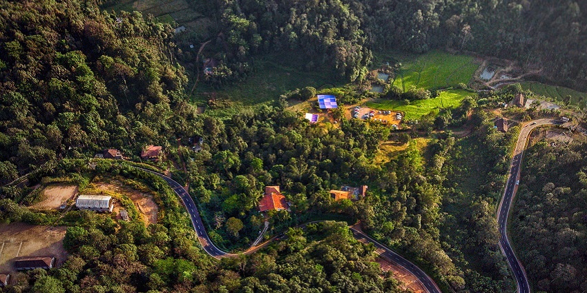 Coorg’s coffee plantations and waterfalls - one of the places for couples in India.