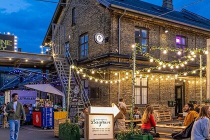 An image showing Copenhagen, Kødbyen, by night, capturing the vibrant Copenhagen nightlife