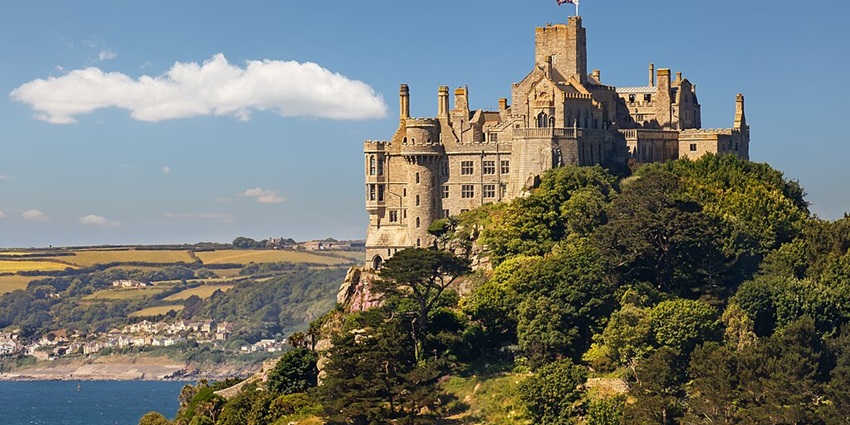 Cornwall is among the best places to visit in England in July with stunning cliffs and sandy beaches.