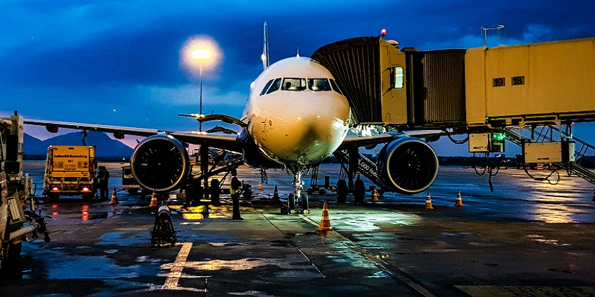 Scenic snapshot of an aeroplane standing on a taxi runaway