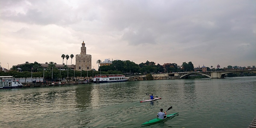 Kayaking, boat and cruise tours are enjoyed by tourists on River Guadalquivir In Seville.