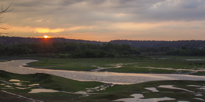 A beautiful sunrise was witnessed at Damdama Lake, a place to visit near Aravali Hills.