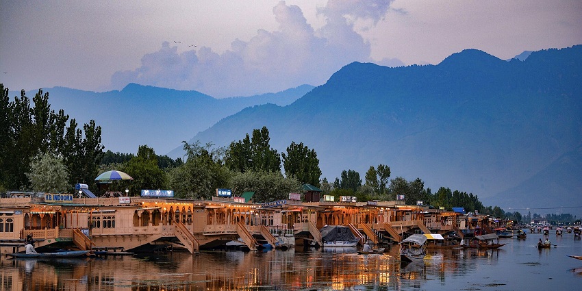 An old heritage type of houseboat in Srinagar Dal Lake houseboat in the Kashmiri style of architecture.