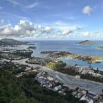 Aerial view of Victoria, Mahé, Seychelles, with Eden Island in the harbor and mountains