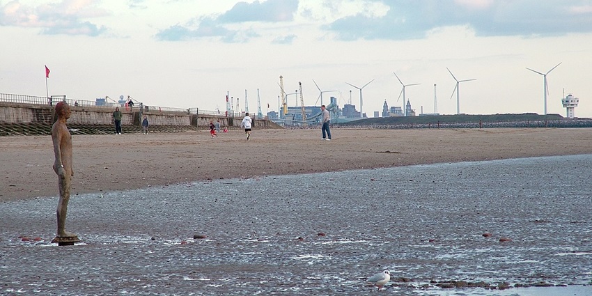 Haunting sculptures of Another Place on Crosby Beach, one of the things to do in Liverpool