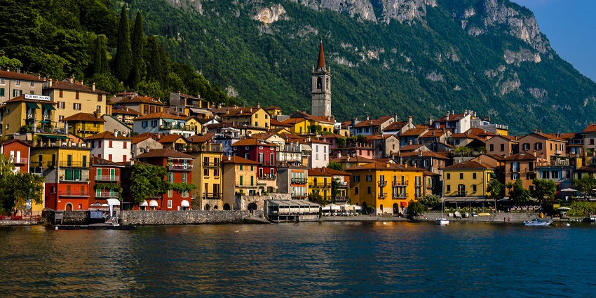 Beautiful and colourful houses in Varenna, as seen from a nearby docking area.
