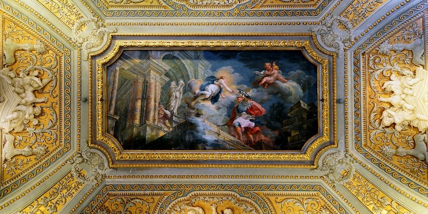 Ceiling of Galleria Doria Pamphilj in Rome featuring gilded stucco and fresco painting